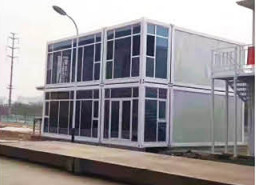 Τρία μικροσκοπικά εκτάσιμα Prefab μορφωματικά σπίτια σπιτιών εμπορευματοκιβωτίων κρεβατοκάμαρων πτυσσόμενα